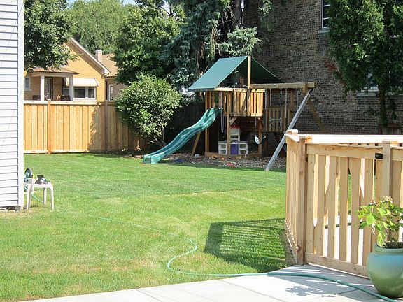 huge lawn and wooden playset