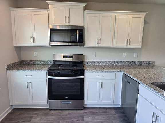 Gas stove, microwave, dishwasher, granite countertops