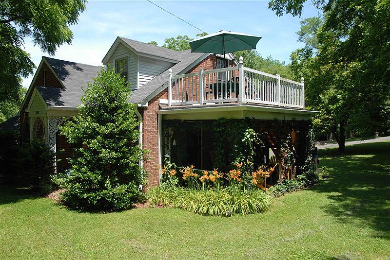 Side View of House and Apt's Private Deck