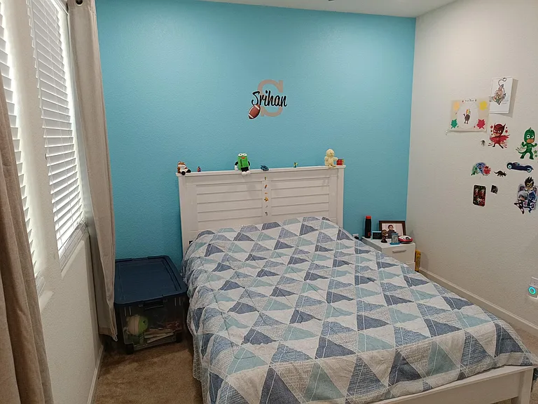 Step into the whimsical world of Bedroom 3, painted with vibrant hues to create a playful haven for kids. Abundant natural light adds a touch of warmth to this charming space. A room designed to spark imagination and create joyful memories. ____