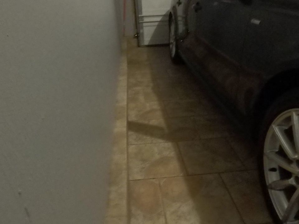 Garage with ceramic tile