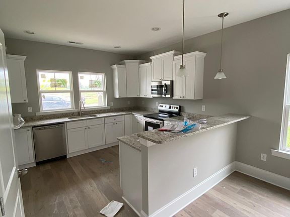 Kitchen with granite countertops.
