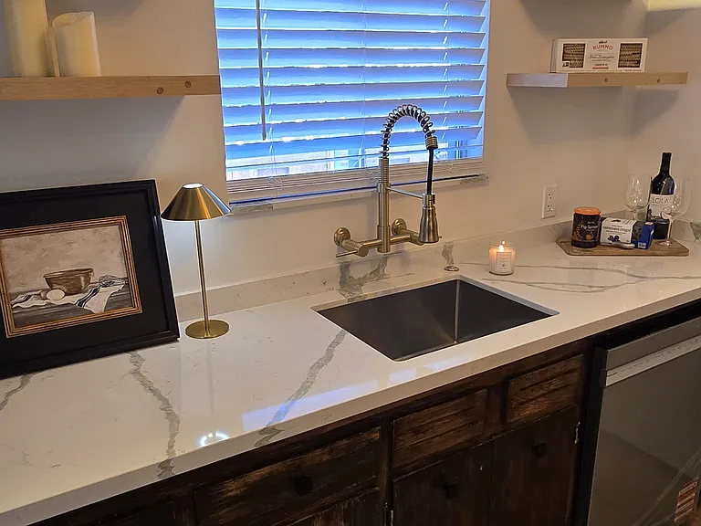 Brand new dishwasher, upgraded coil spring faucet with stainless sink.
