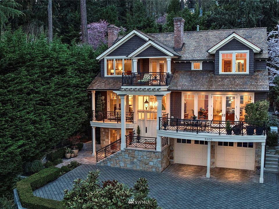 Waterfront living and stunning Cape Cod style on Mercer Island. Enjoy sparkling Lake Washington views from three separate decks.