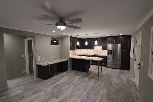 Open floor plan 
sorry for the dark pictures