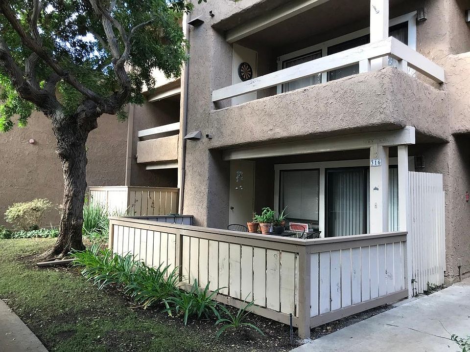 View of Patio attached to family room. Also you can see the master bedroom's patio in the far right.