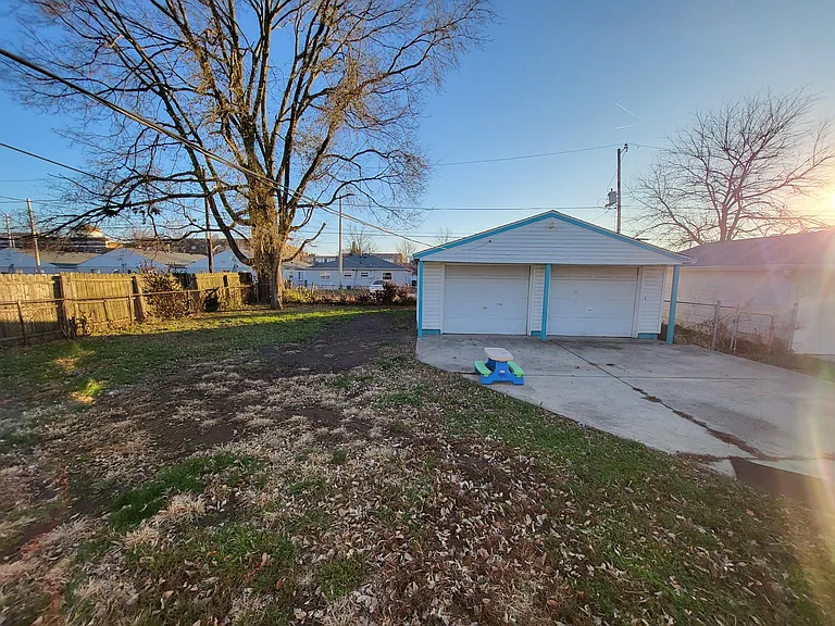 Backyard and 2 car garage. Street parking is also available