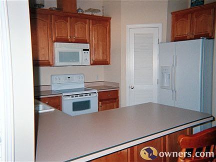 Kitchen View 1, refrigerator included.