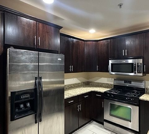 Gas stove and all stainless steel appliances (refrigerator/freezer, microwave, oven/stove, dishwasher, sink w/ garbage disposal)