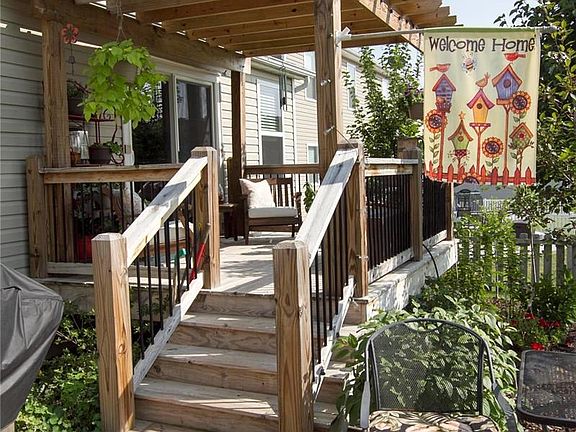 Steps down from upper deck to a lower 10' x 12' deck.  Plenty of room for a backyard bbq party!