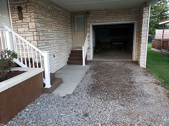 Attached garage and carport
