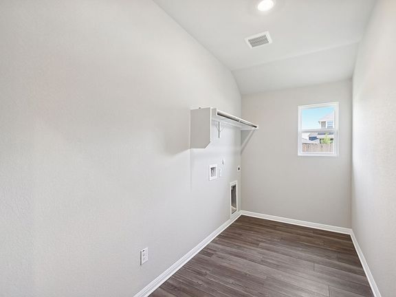 The large laundry room helps make laundry day a breeze.