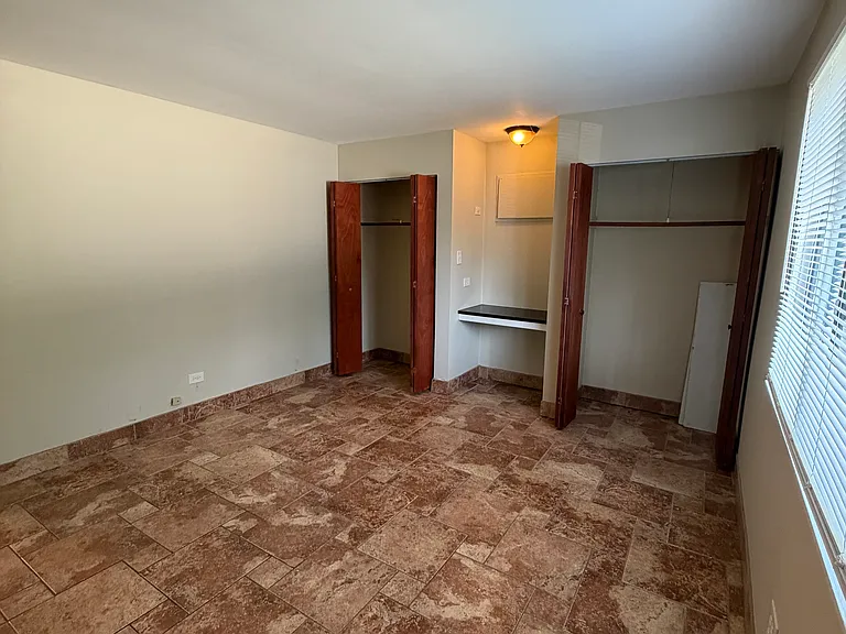 8469 Archer Ave #104 — Photo 7