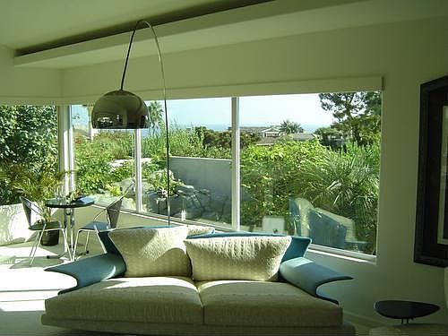 Beautiful river and soaking pool behind Living, Dining and Family Rooms