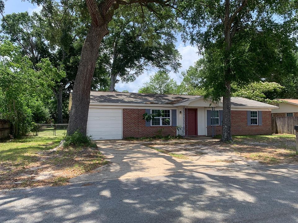 front of house (garage closed off into bedroom)