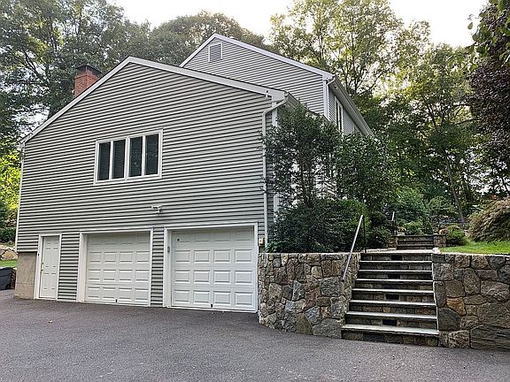 Two car garage and large dri