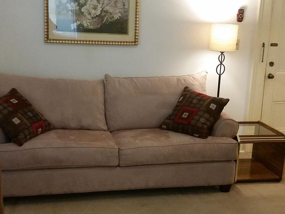 11 foot coved ceilings!  Great comfy sofa with recliner chai