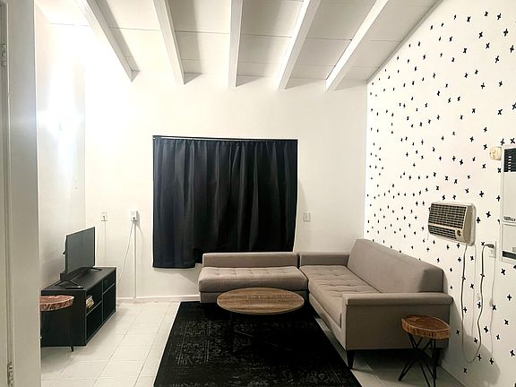 Open beams throughout giving it that mid century charm.