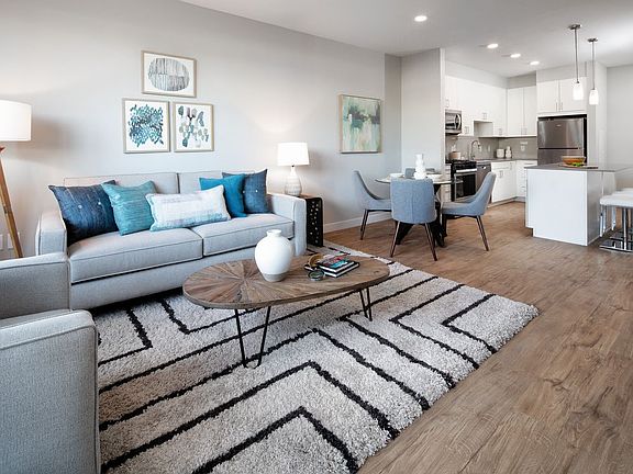 Living and dining areas with hard surface flooring throughout (Representative photo)