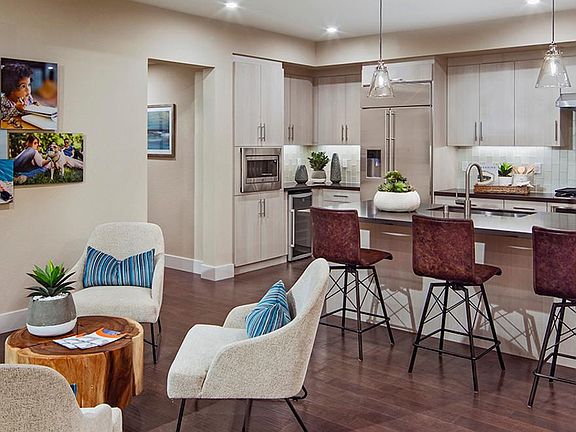 Wired for flat screen TV in Master and Living room. New stainless steel appliances with in-unit full size front loading laundry. _Hardwood and tile flooring. _Water softener, water purifier and tankless water heater.