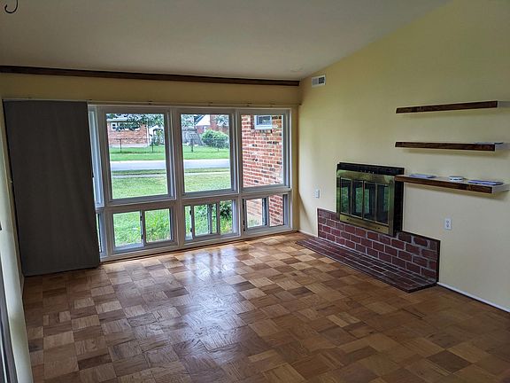 Left angle: Living Room + Chimney + glass windows