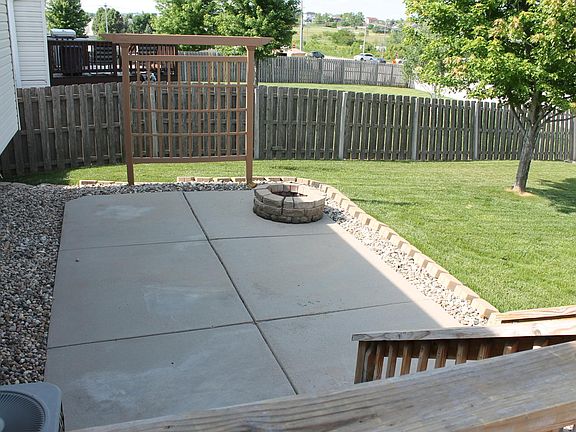 CONCRETE PATION WITH BURN PIT