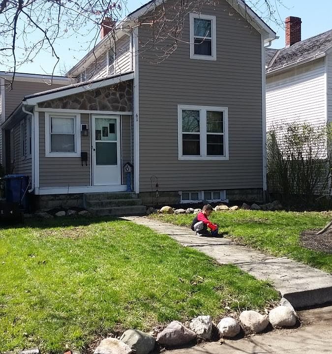 New siding and rock border