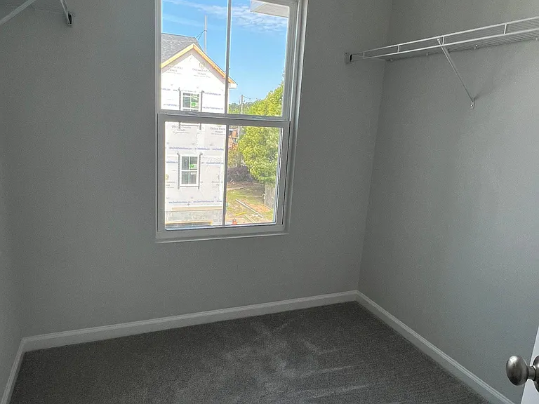 Master bedroom walk-in closet (could also be a small office or workout room!)