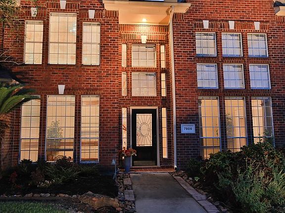 Striking architecture with two story entry.