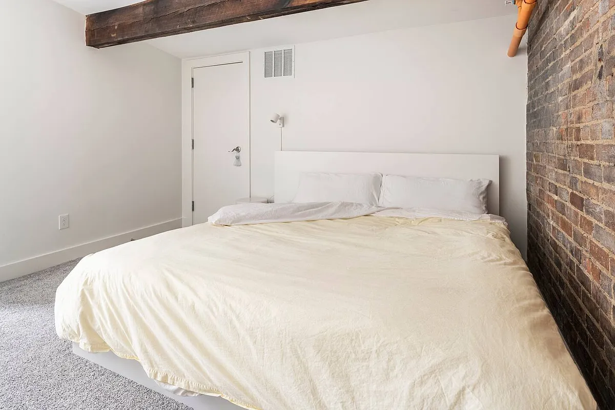 Second-floor bedroom with plenty of space for a king-size bed - 5 W 12th St #8