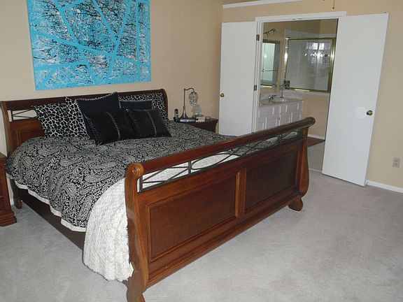 Master bedroom with bath, dual sinks and walk-in closet