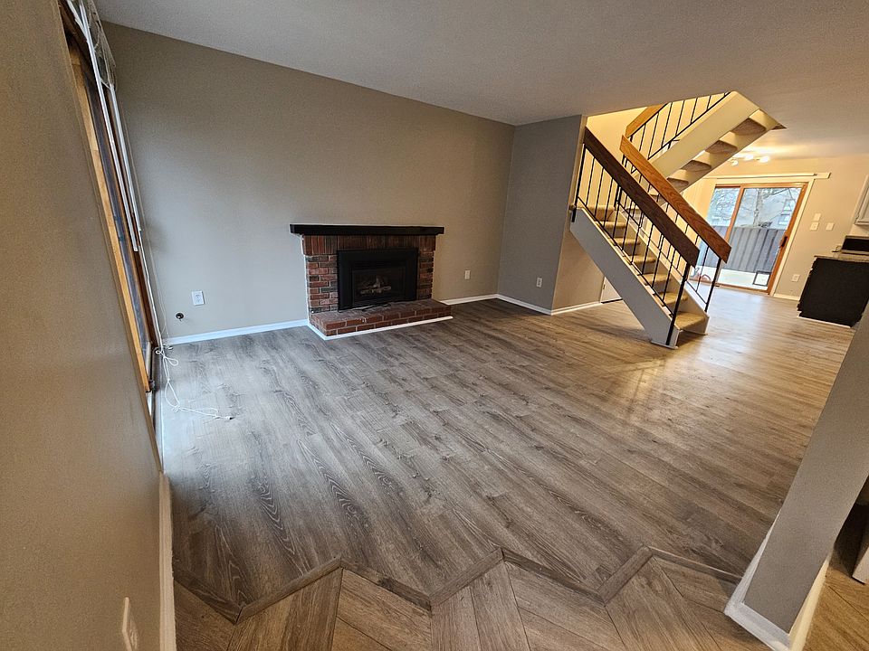 Living room with gas fireplace.