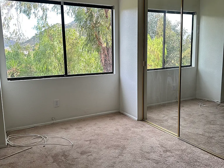Bedroom #2 Mirrored Wardrobe Doors and View