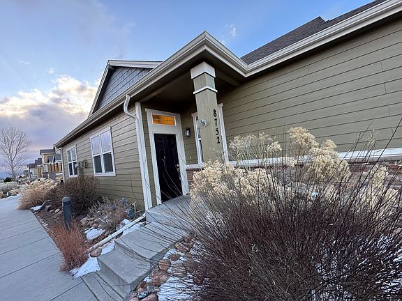 View of entry doorway and mountains to the west.