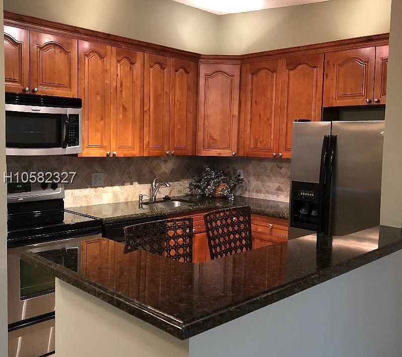 1st image of 9430 S Belfort Cir #211