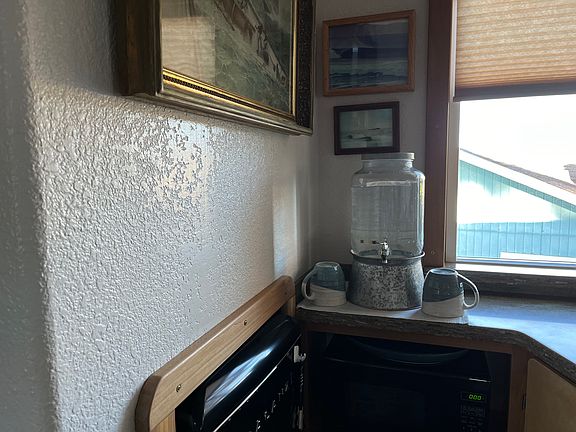 Counter and small fridge, freezer