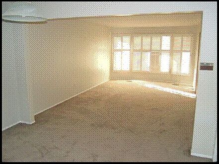 Large living and dining rooms with bay window