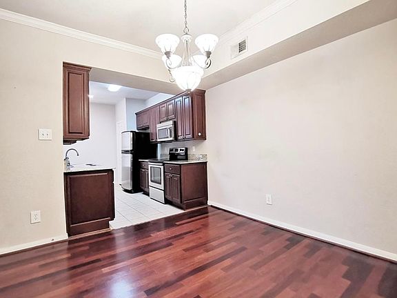 dinning area with laminate flooring
