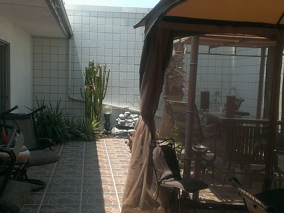 enclosed Tiled Patio