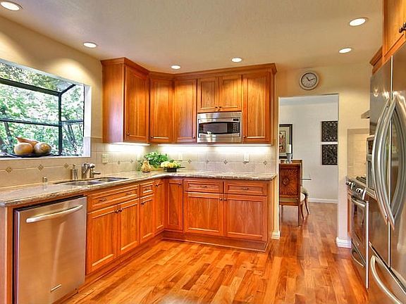 39931 San Simeon Court Kitchen with Natural Cherry Custom Cabinets