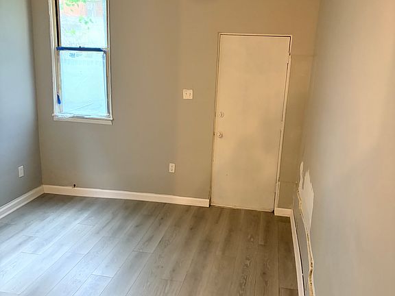 Living room with Rear exit door