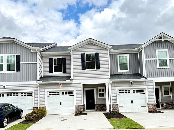 Features a 1 car garage and a driveway that fits 2 vehicles.