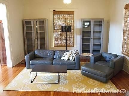 High ceilings & wood floors throughout