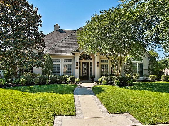 Stunning 1 story custom home located in a quiet cul de sac in Champion Forest