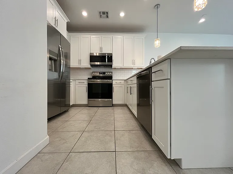 Kitchen with SS appliances
