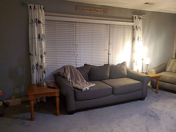 Living room , custom blinds stay