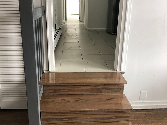 Stairs into kitchen area