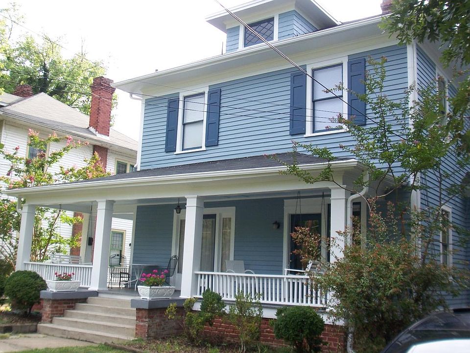 Front porch with entry door on right side