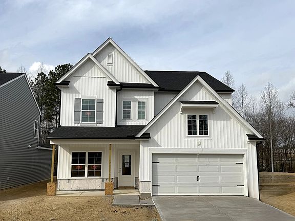 Exterior - Classic siding and a breezy coastal palette.