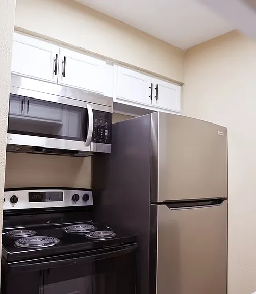 Modern kitchen features with updated appliances and functional layouts.